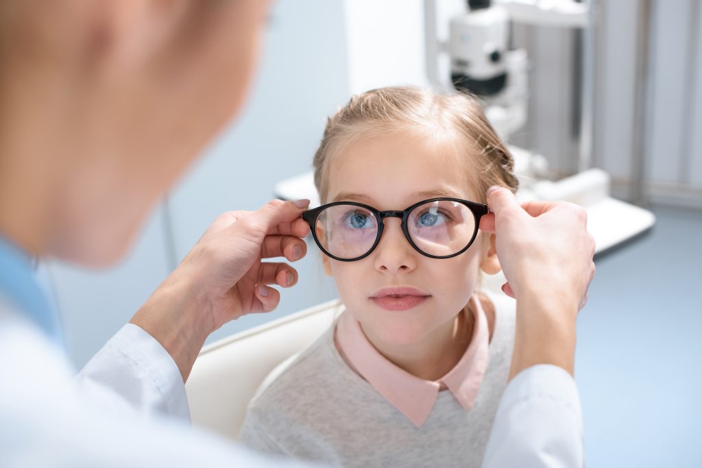 Optometrist,And,Little,Kid,In,Glasses,In,Optics