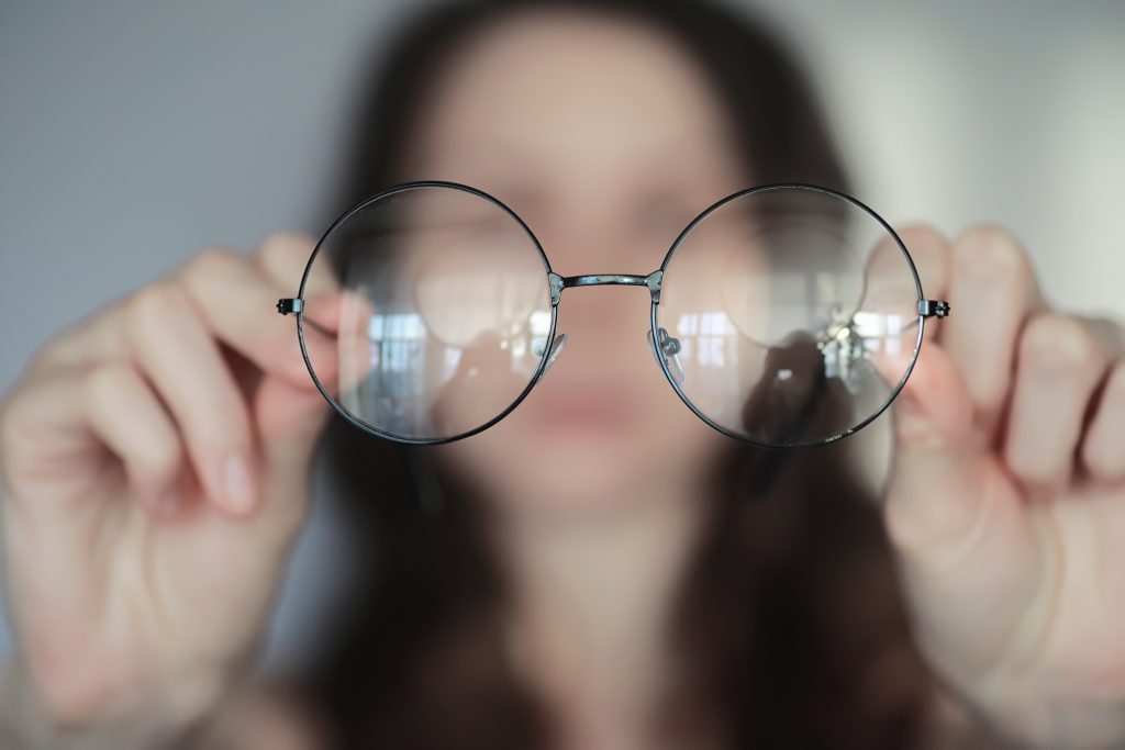 The,Concept,Of,Poor,Vision.,Hold,A,Contact,Lens,And